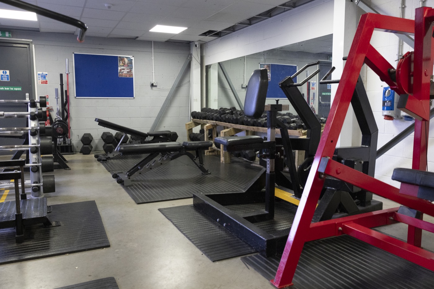 Strength training area with sled track