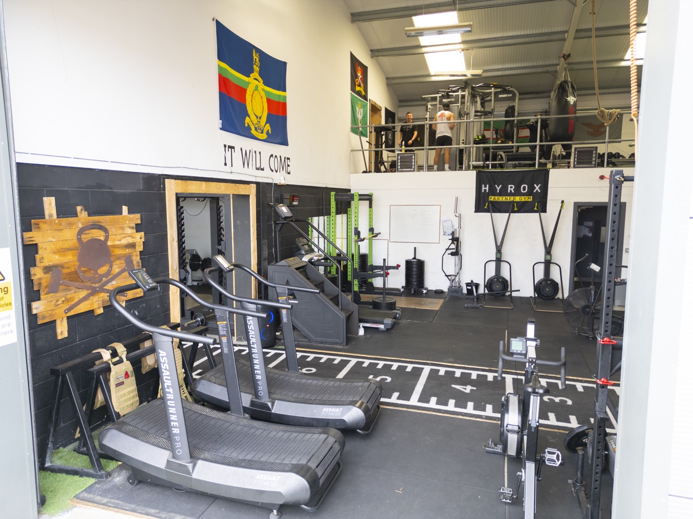 Functional training rigs and sled track